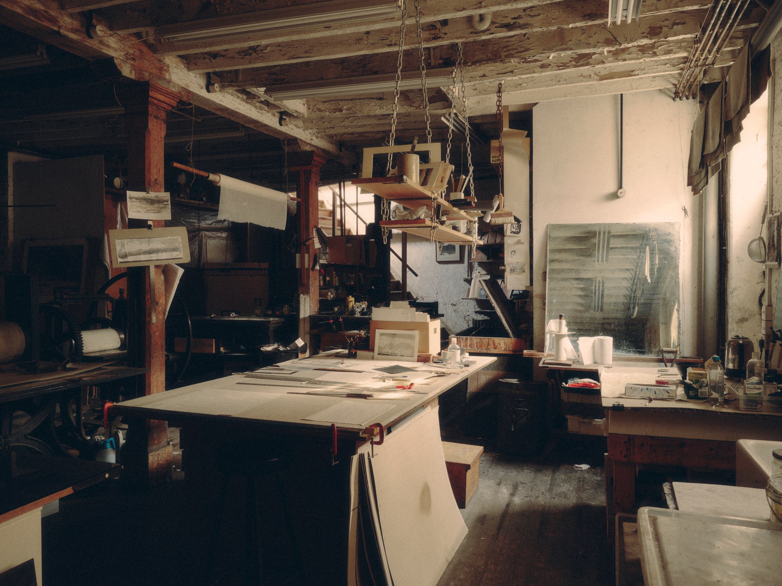 Norman Ackroyd studio London. Architecture Building Factory Manufacturing Workshop Wood Desk Furniture Table and Indoors